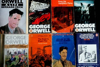 A collection of paperback books by, or on George Orwell