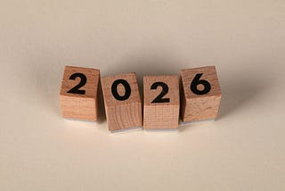 Wooden blocks in a row displaying 2026
