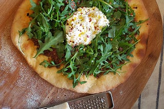 Neapolitan Style Pizza with a Walnut Bolognese and Fresh Arugula