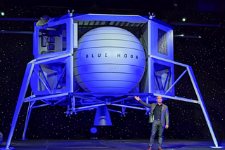Blue Moon, lunar lander replica, at the Washington Convention Center, with Jeff Bezos standing in front of it