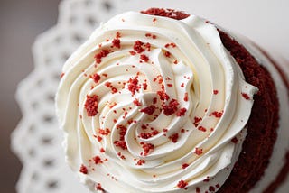 red velvet cake, dessert, close-up of whipped cream and red crumble, on a plate | © pockett dessert, red velvet cake