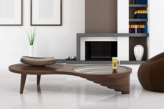 A large coffee table is a perfect addition to your home decor where you can sit & enjoy family time. Choose the best coffee tables to match your living room decor.