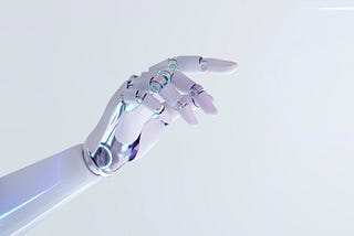 A white robot’s hand with five fingers.
