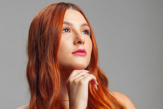 Woman pondering brand promises