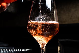 How did alcohol start to support international trade and travel?