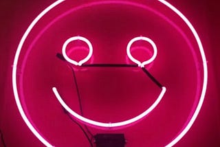 pink neon smiley face