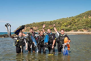 Scuba students in shallow waters
