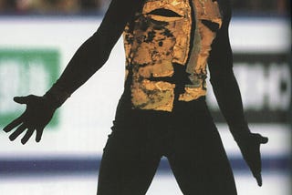 Action shot of figure skater Alexie Yagudin during his Man in the Iron Mask 2002 Olympic long program