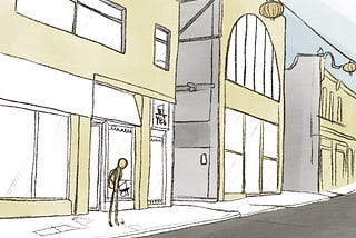 A drawing of a city street. Paper lanterns hang above the buildings, which are coloured yellow and grey. A small figure stands outside a shop, looking down.