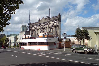 An older heritage facade having been saved while the building behind it is being demolished and redeveloped.