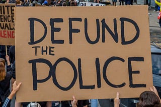 The True Meaning of “Defund the Police”
