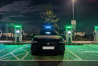 Vauxhall Corsa-E at the Rugby Moto Services charging on a Gridserve charger.