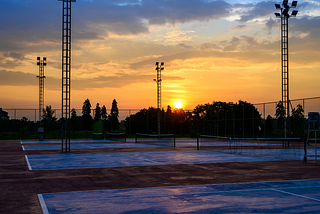 Tennis courts at sunset by Dr. Gregory Charlop