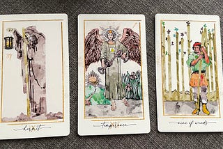 3 Tarot cards laid out from left to right: Hermit, Temperance, Nine of Wands. The illustrations are based on traditional Tarot card design, but recreated in watercolor.