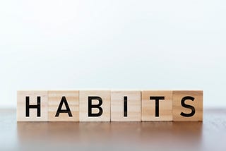 Blocks spelling out “habits”.