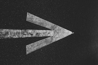 Road painted with an arrow to the right.