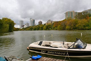 Ski boat floating on Veteran’s Park Lagoon, Milwaukee WI