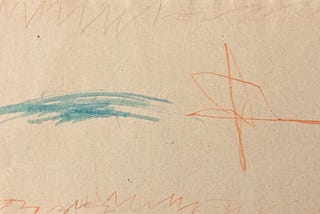 Pencil drawing on a long horizontal strip of paper. The top and bottom edges of the paper have zig-zaggy markings in brown-orange. In the centre of the paper, to the left are some horizontal squiggles in blue and, to the right, a cross-shaped image in orange.