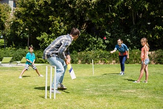 The happiness of playing cricket in a local park
