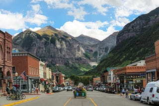 A view of beautiful mountains from the street of historic Colorado mining town of Telluride.
