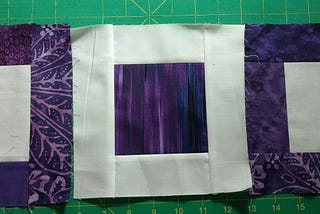 Purple and white quilt — no title yet