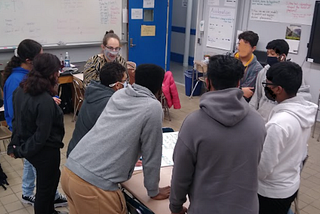 Levy meeting in a circle with eight students