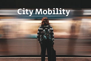 City Mobilty, a woman waits to enter the incoming subway