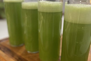 4 bottles of freshly made celery juice