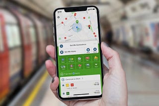 Hand holding a smartphone with Citymapper in a metro station.