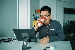 A busy solopreneur drinking coffee