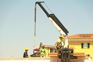 Minimize labor, boost productivity with a jib boom and lifting hoist attachment