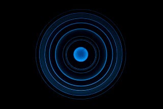 Ripple effect, blue circle on black background