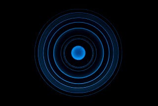 Ripple effect, blue circle on black background