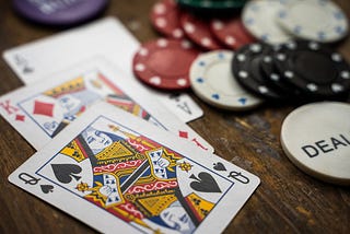 poker chips and cards on a table