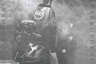 The album cover of The Who’s rock opera, Quadrophenia, which shows a young man on a scooter, wearing a raincoat.