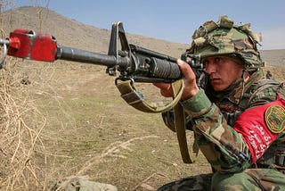 Members of the Afghan National Army take part in an exercise on the ANAOA plains in Kabul.