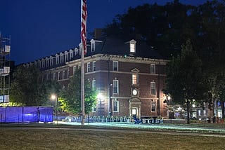 Photograph of campus flag at half staff for Charlie Kirk