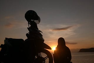 Me taking a moment to watch sunset during a quick motorcycle adventure