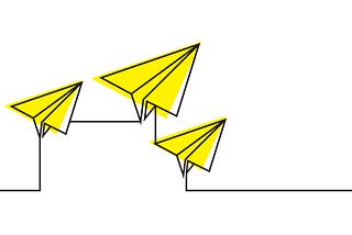 An image of paper airplanes facing upwards, signifying a direction in growth