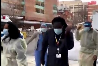 Healthcare workers are dancing in vibrant videos amid vaccine shipments arriving for the first…