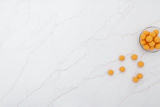 Elevate Your Space with the Luxury of Calacatta Oro Quartz