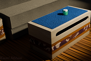 A candle on a coffee table