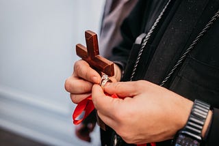 Coptic priest blessing the engagement rings