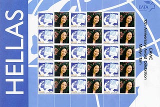 A headshot of a woman on a Greek stamp