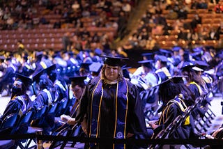 Photo of student at college graduation.