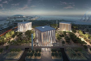 Image shows the architectural visualisation of the Abrahamic Family House designed by David Adjaye Associates, a complex of three large buildings, one for each faith of the Abrahamic tradition: Christianity, Judaism and Islam.