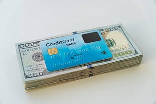 Which is better carrying money or a credit card?