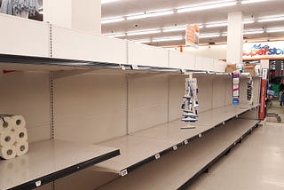 Empty shelves in the toilet paper aisle of an Atlantic Superstore supermarket of Halifax, Nova Scotia, Canada, on 12 March 20