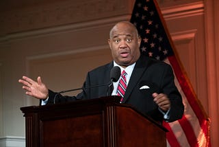 Dominic Carter emceeing the prestigious PAL Luncheon, combining his role as a journalist and keynote speaker to inspire leaders and community members.