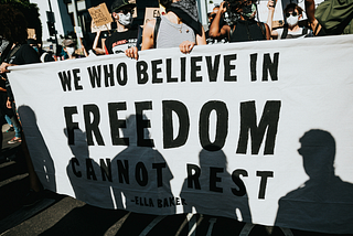 In Defense of “Woke”
Why Awakening to Injustice Is a Sacred American Tradition